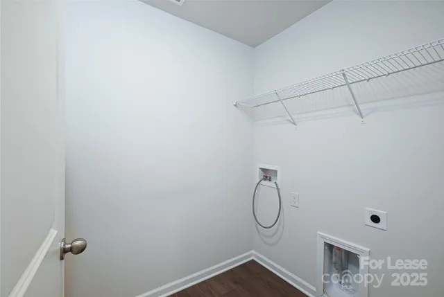 a bathroom with white walls