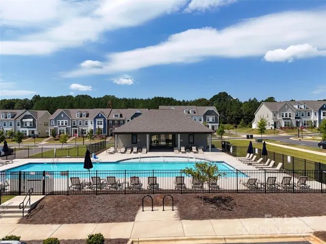 a front view of building with yard