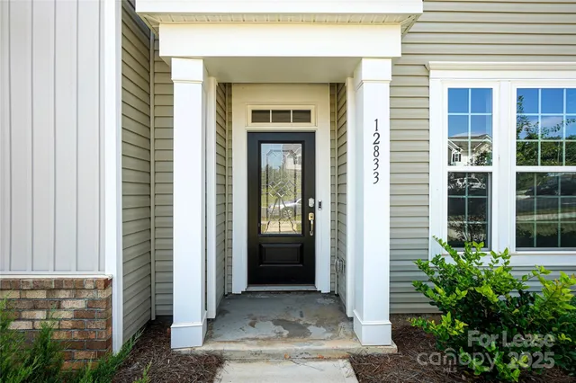 a view of a entryway of a house