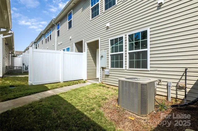 a house with yard in front of it