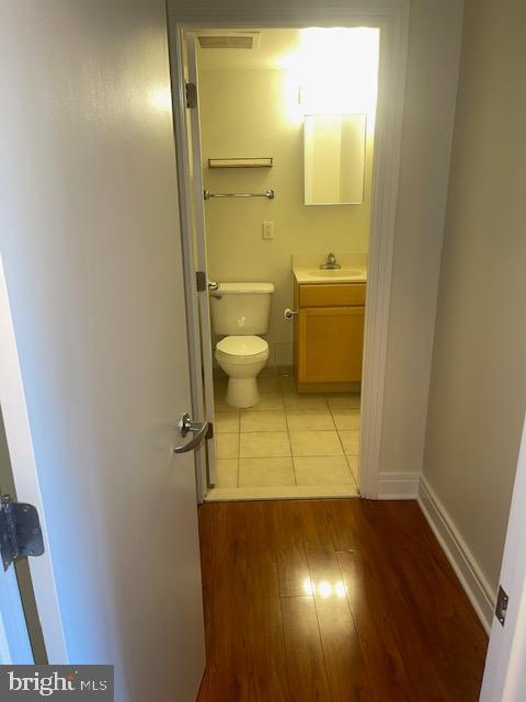 800 4th Street Southwest, Unit S503 Washington, DC 20024 - Photo 11 of 21 a bathroom with a sink and a mirror