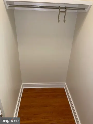 a view of a room with racks on the wall