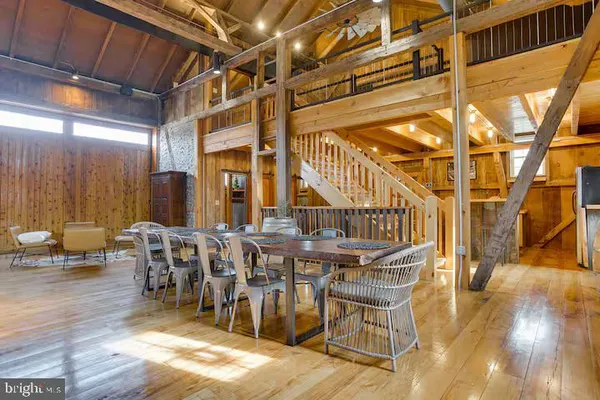 a view of a hall with wooden floor