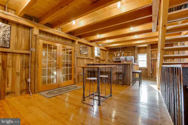 a living room with lots of furniture