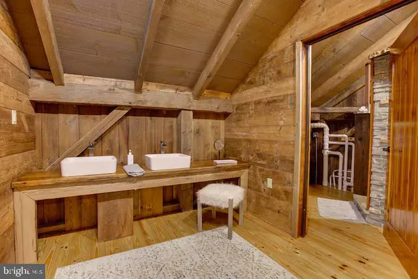 a bedroom with a bed and a walk in closet