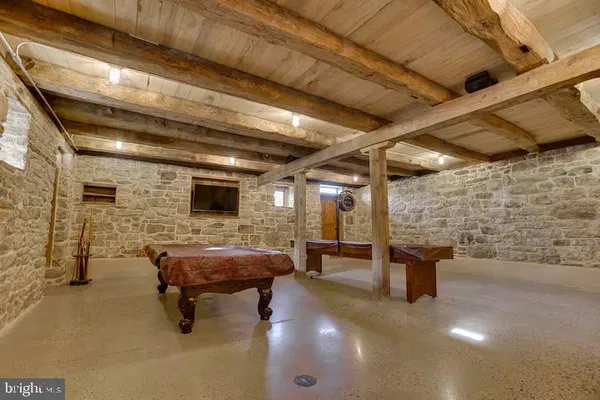 a view of a room with wooden racks