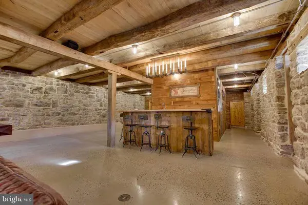 a view of an empty room with furniture