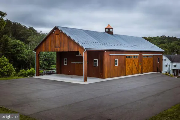 a front view of a house with a garage