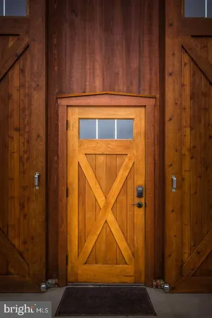 a room with a door and a chair