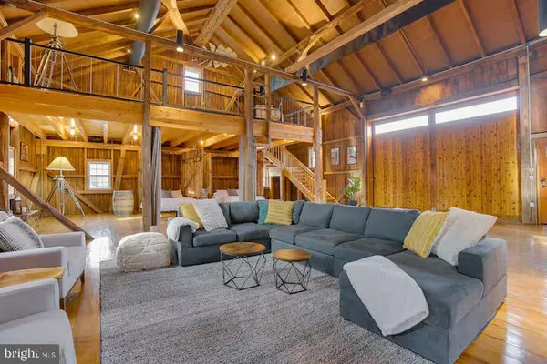 a view of a dinning table and chairs in the patio