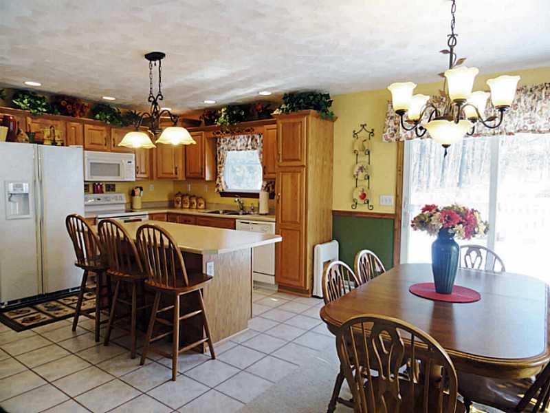 440 Lemmon Road Latrobe, PA 15650 - Photo 5 of 25 Kitchen. Country kitchen with oak cabinets, island, ceramic floor and complete appliance package