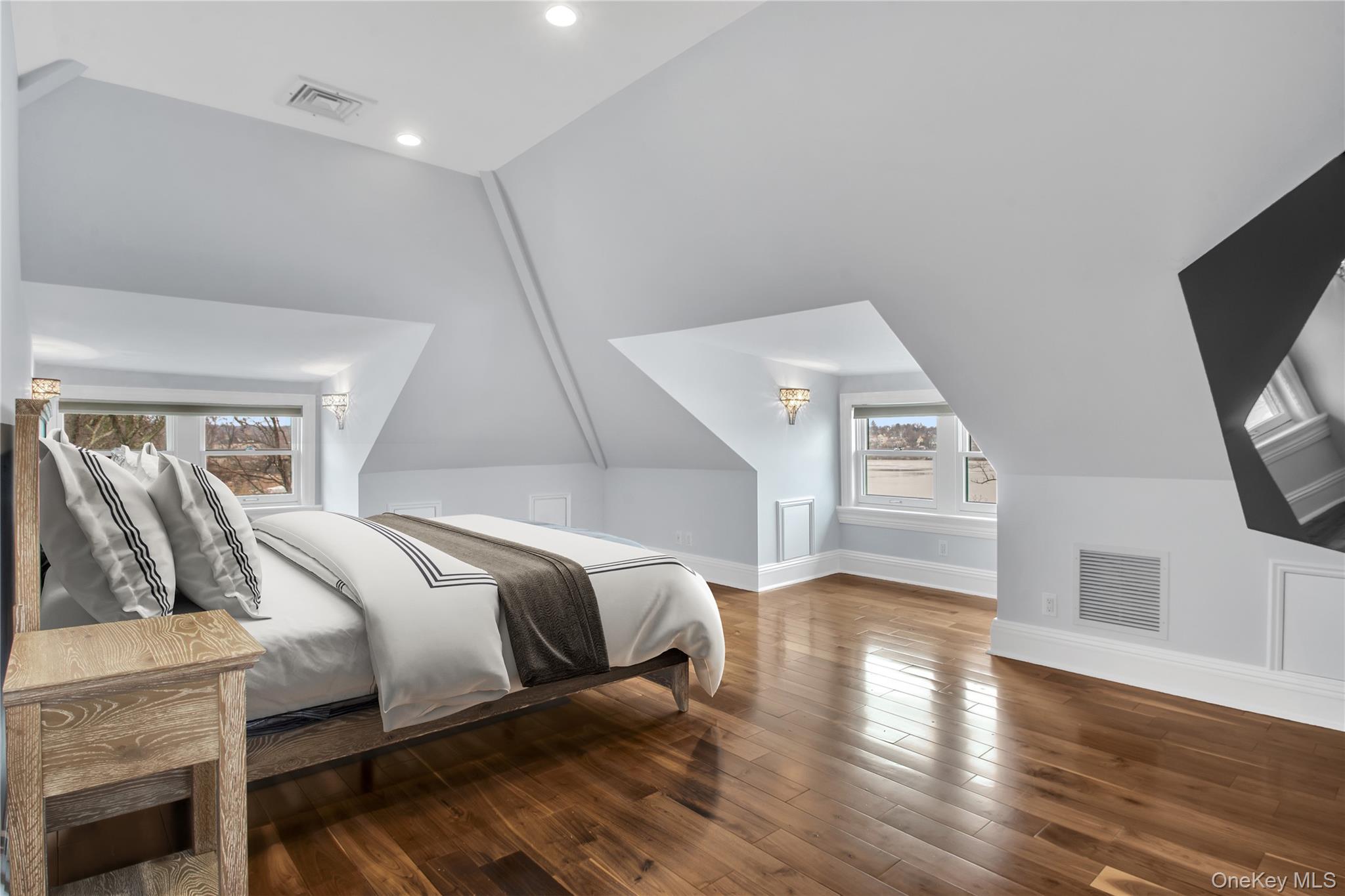 102 Shore Road Queens, NY 11363 - Photo 18 of 22 3rd floor bright corner bedroom featuring water views, wood-type flooring and vaulted ceiling