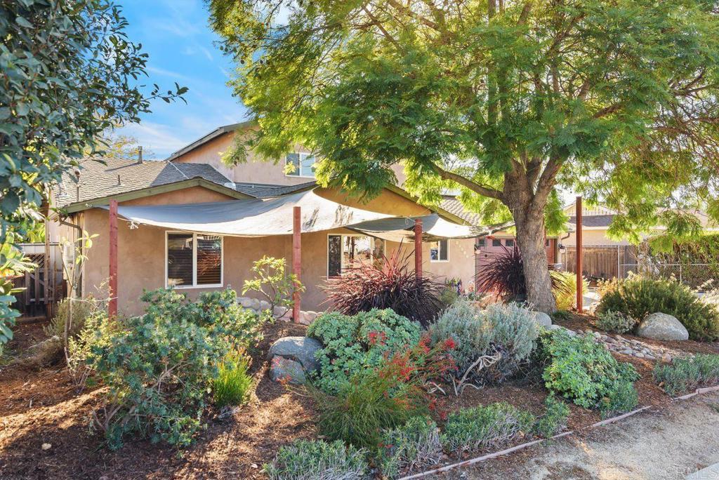 14429 Springvale Street Poway, CA 92064 - Photo 44 of 47 a front view of a house with a yard