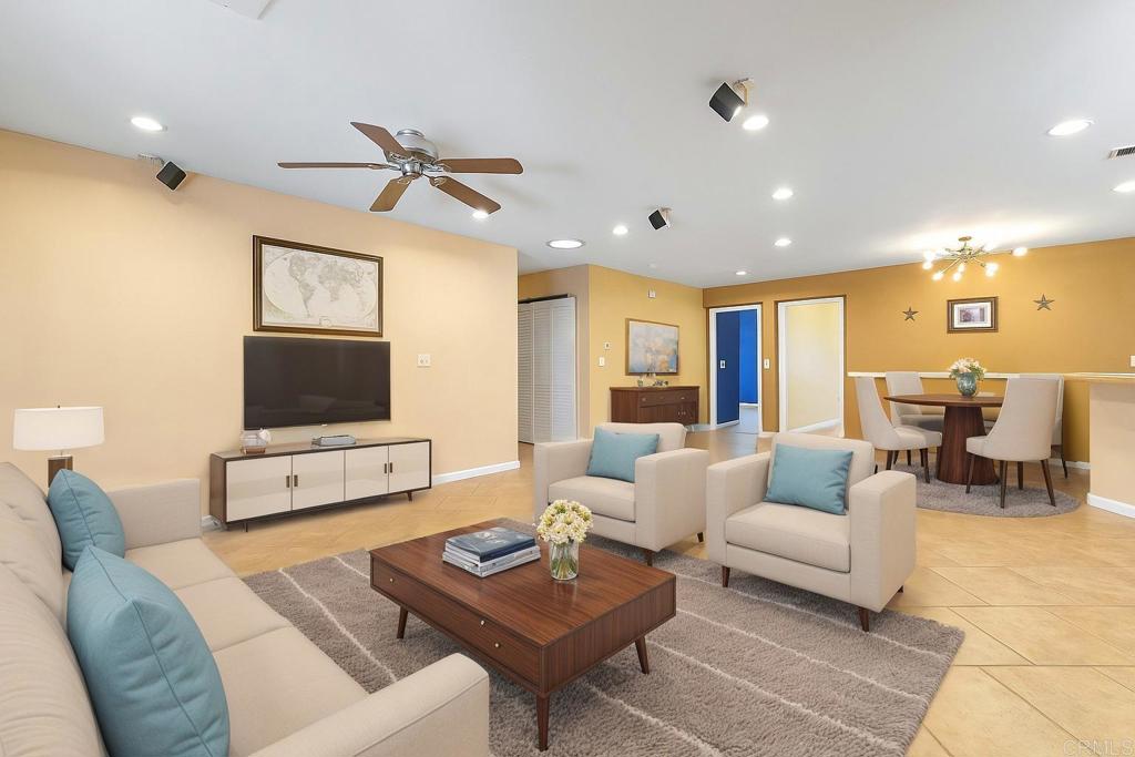 14429 Springvale Street Poway, CA 92064 - Photo 5 of 47 a living room with furniture and a flat screen tv