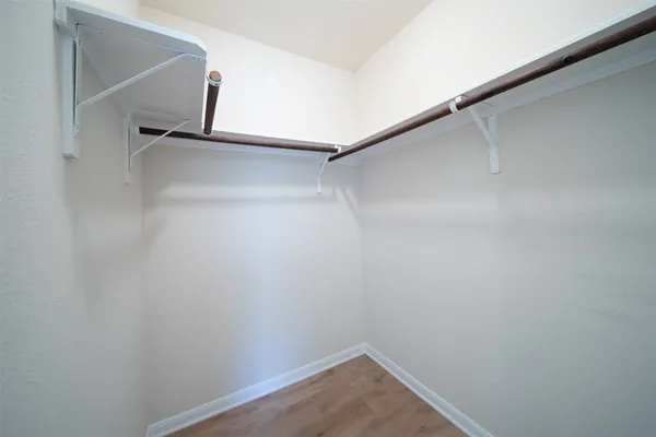 a view of an empty walk in closet