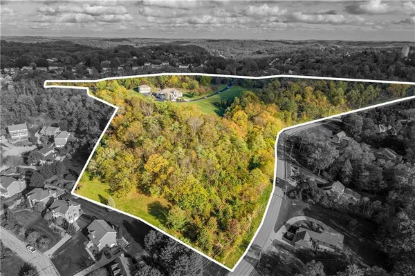 a view of swimming pool from a balcony