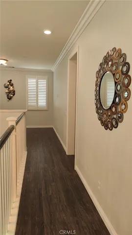 a bathroom with a shower sink and mirror