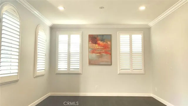 a view of a kitchen with a sink and a window