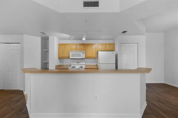a kitchen with stainless steel appliances a sink and a window