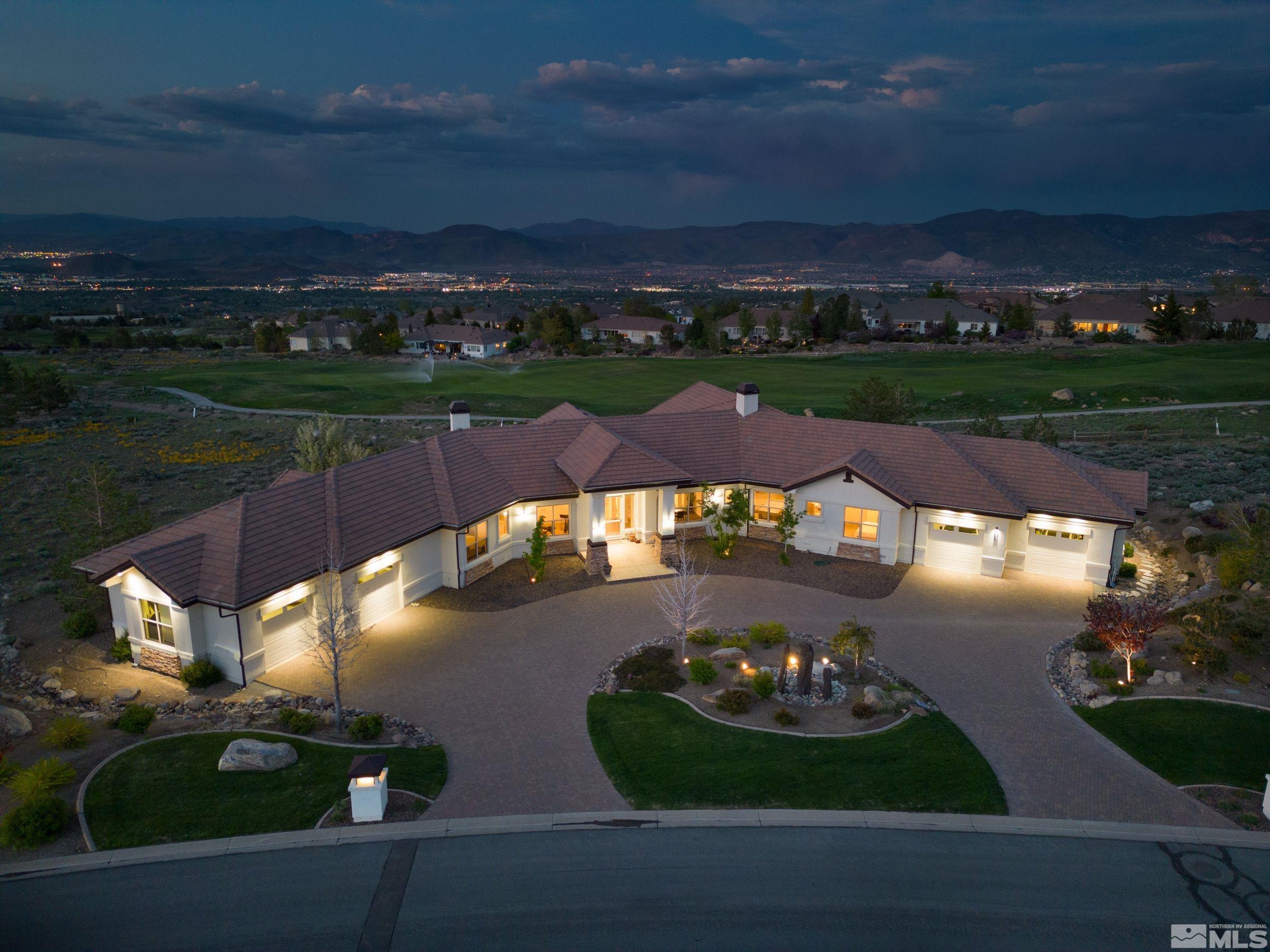 front view of a house with a garden