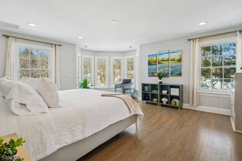 5 Farley Road Short Hills, NJ 07078 - Photo 9 of 26 a bedroom with a bed furniture and a large window