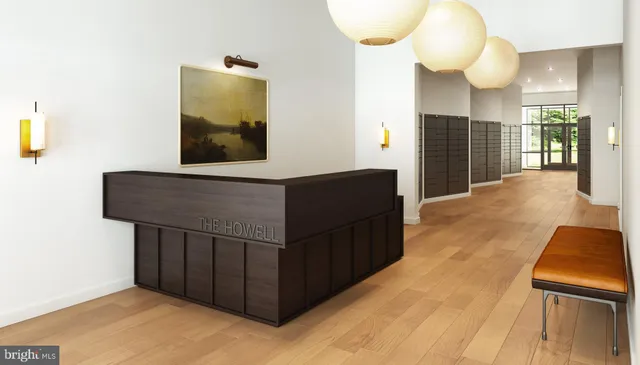 a view of staircase with wooden floor