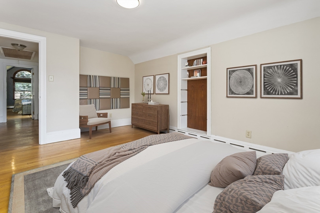 29 Boulevard Road Dedham, MA 02026 - Photo 21 of 34 a spacious bedroom with a bed and closet