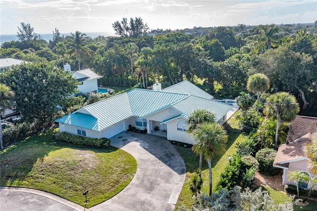 an aerial view of a house having yard