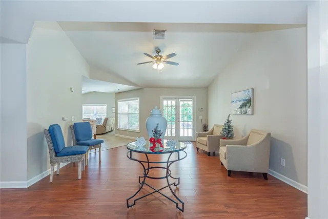 a living room with furniture and window