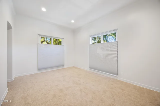 an empty room with a hallway