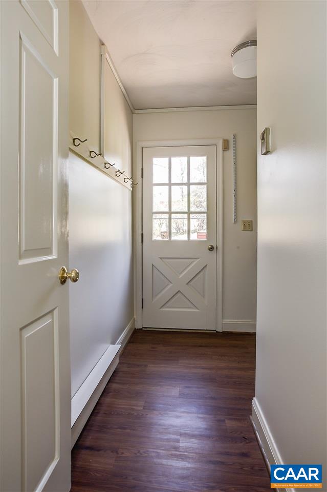 2711 Huntington Road Charlottesville, VA 22901 - Photo 20 of 39 an empty room with wooden floor and windows