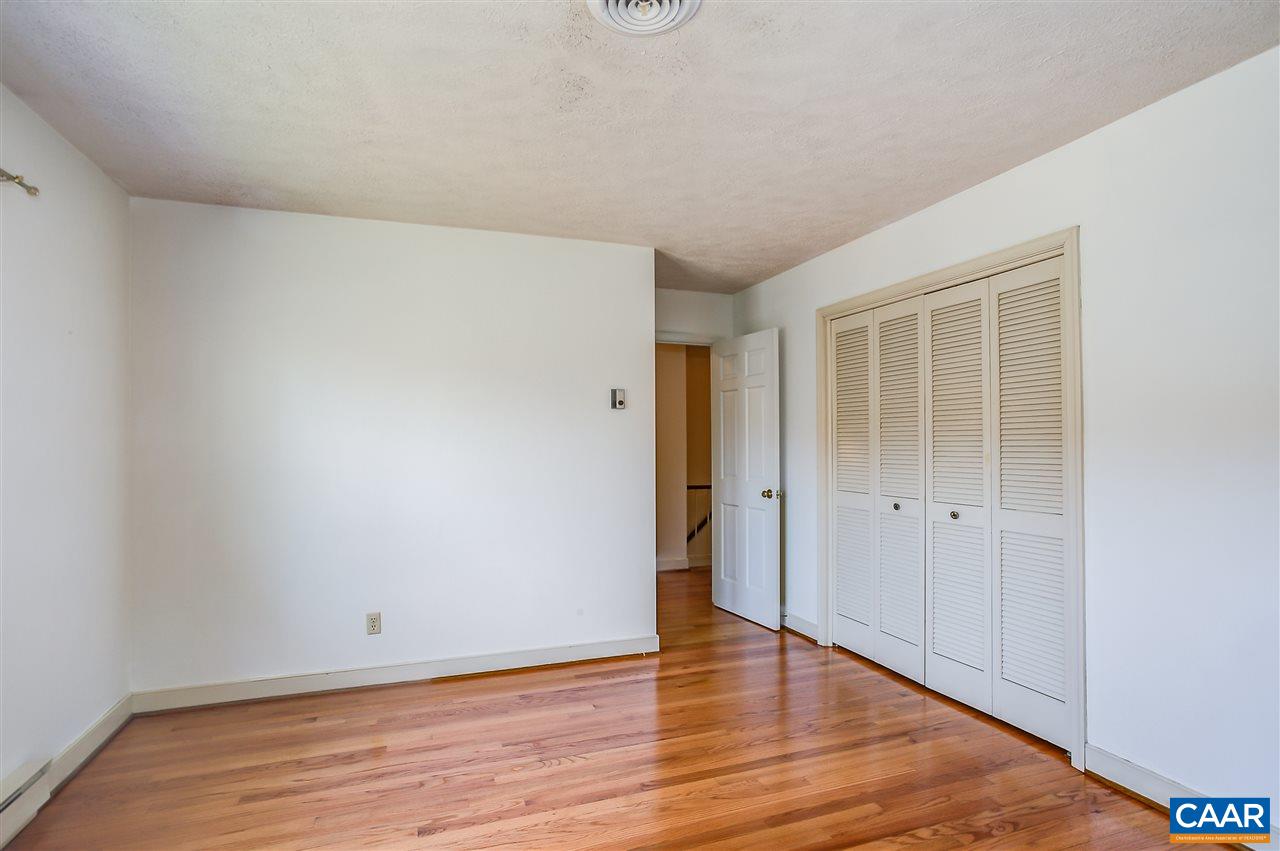 2711 Huntington Road Charlottesville, VA 22901 - Photo 29 of 39 a view of an empty room with wooden floor and entrance