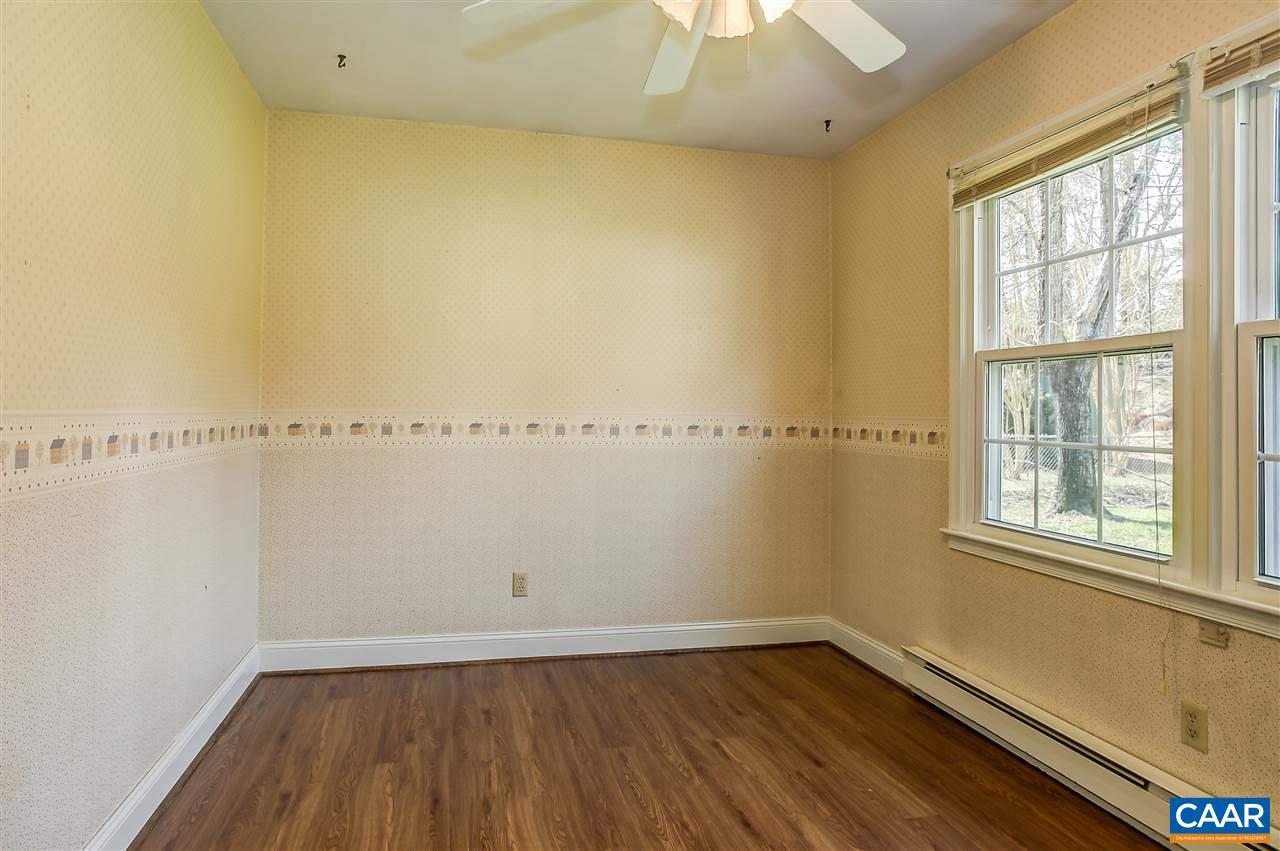 2711 Huntington Road Charlottesville, VA 22901 - Photo 6 of 39 an empty room with a window