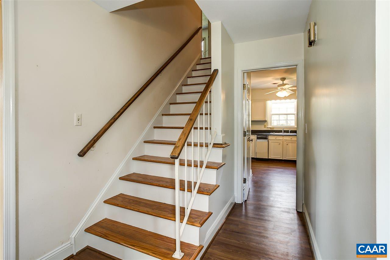 2711 Huntington Road Charlottesville, VA 22901 - Photo 7 of 39 a view of a hallway with wooden floor and entryway