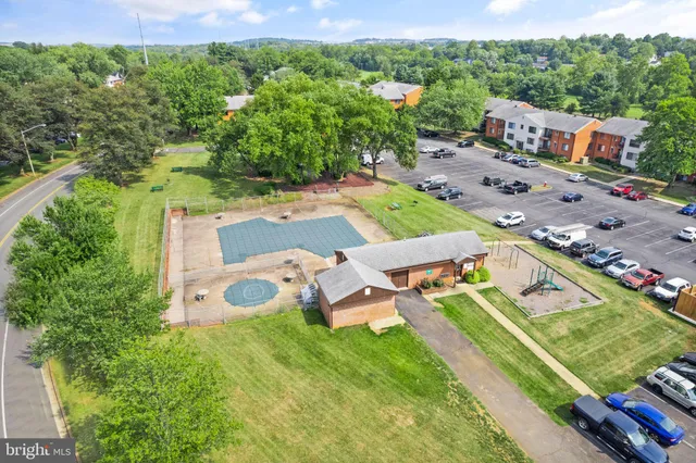 an aerial view of a house with a garden