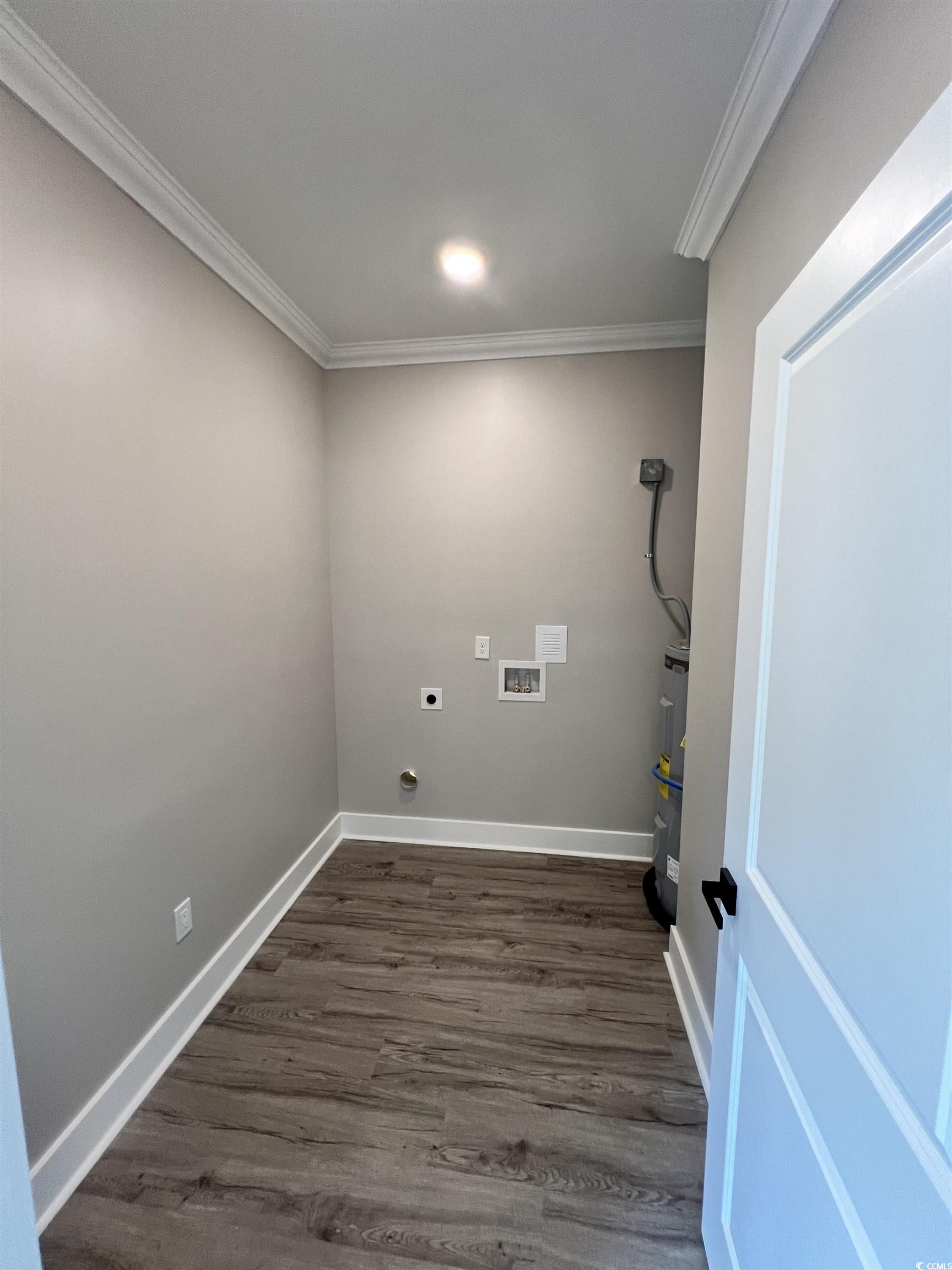 1795 Hemingway Street Conway, SC 29527 - Photo 19 of 29 Laundry area featuring ornamental molding, dark wood-type flooring, electric dryer hookup, and washer hookup