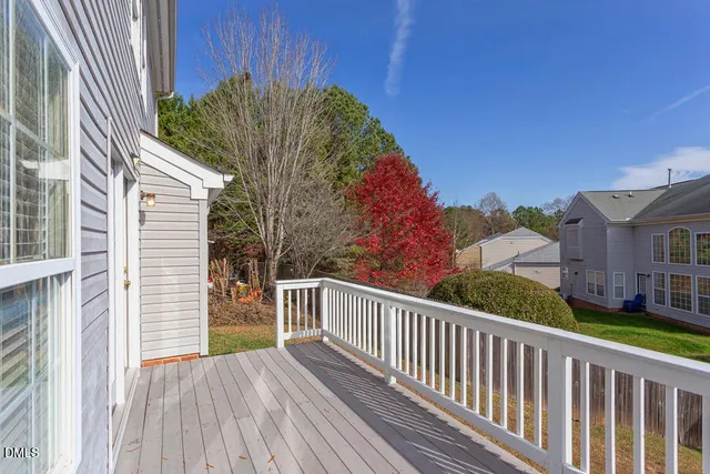a view of a houses with a street view