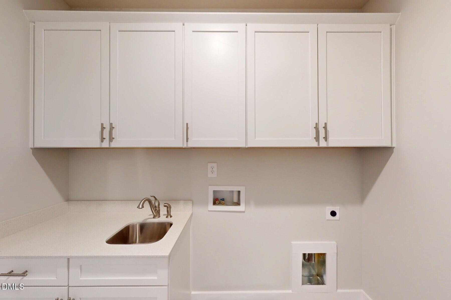 5332 Aged Pne Road Apex, NC 27523 - Photo 24 of 27 a view of cabinets and sink