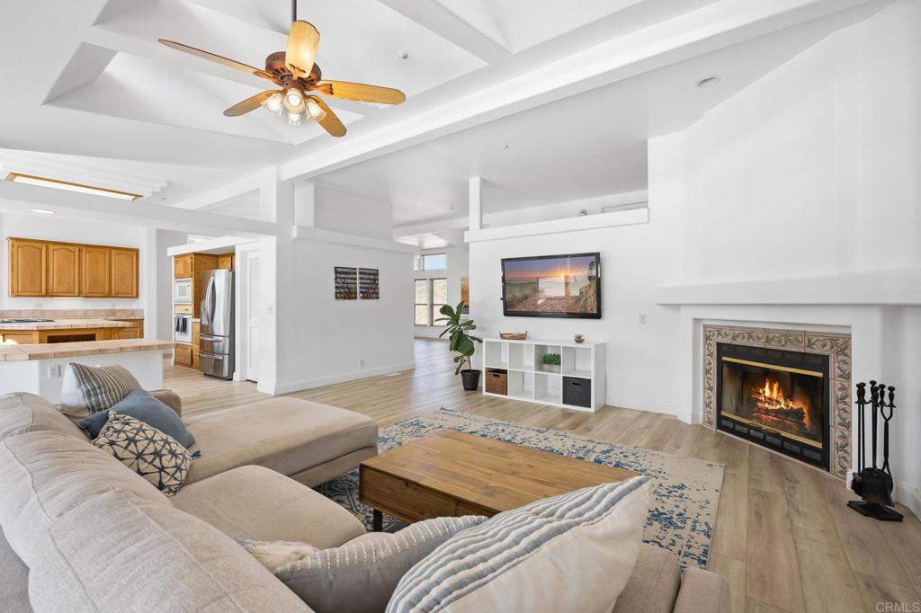 1369 Willson Road El Cajon, CA 92019 - Photo 1 of 1 a living room with furniture a fireplace and a flat screen tv