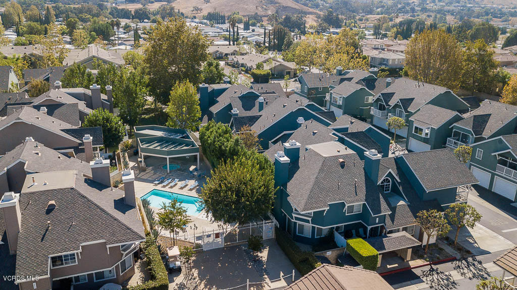 1818 Rory Lane, Unit 8 Simi Valley, CA 93063 - Photo 16 of 31 an aerial view of multiple houses with outdoor space