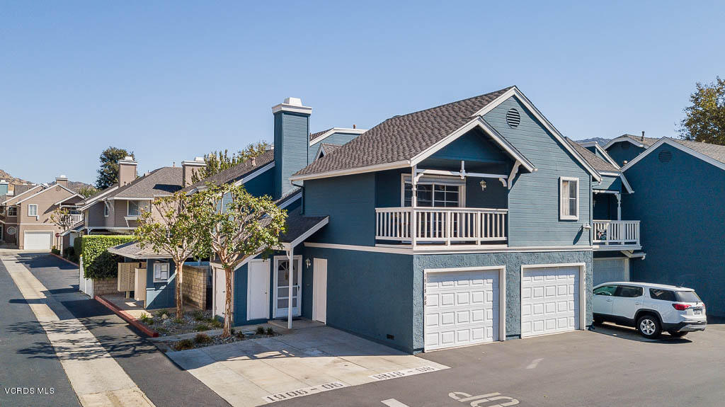 1818 Rory Lane, Unit 8 Simi Valley, CA 93063 - Photo 4 of 31 a car parked in front of house