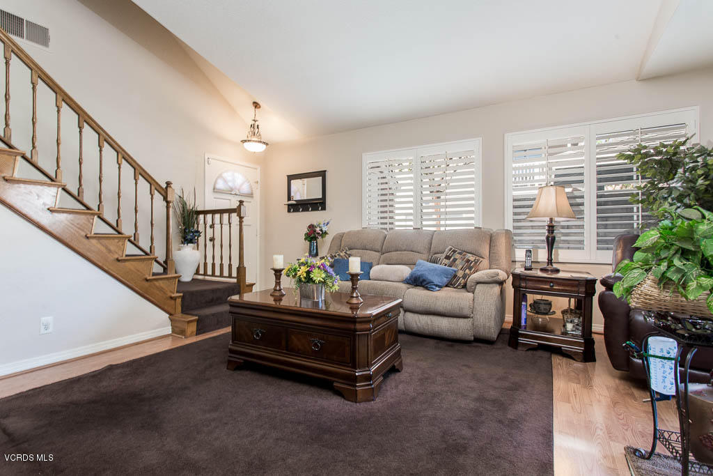 1818 Rory Lane, Unit 8 Simi Valley, CA 93063 - Photo 7 of 31 a living room with furniture and a potted plant