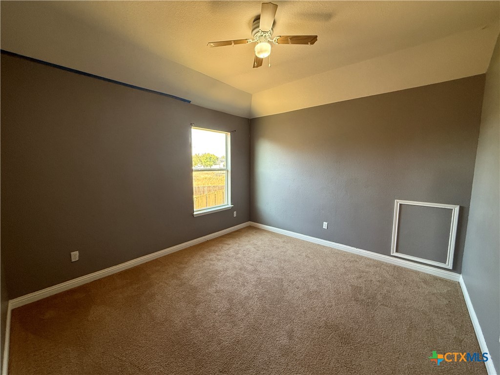5607 Siltstone Loop Killeen, TX 76542 - Photo 33 of 48 an empty room with windows and fan