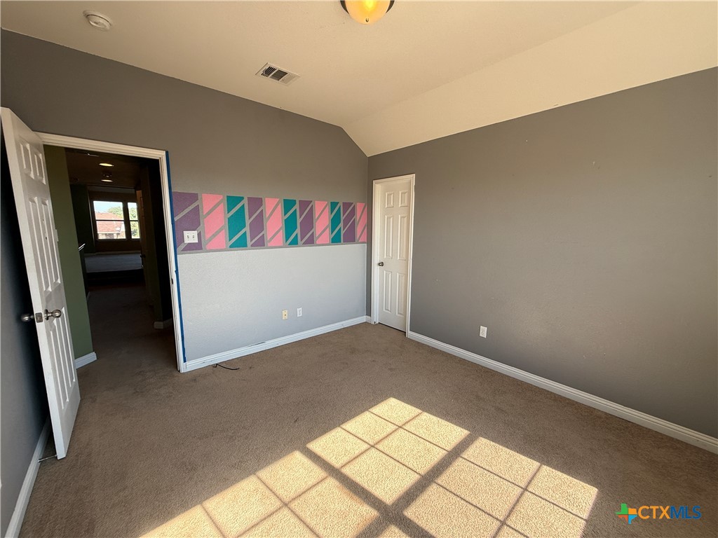 5607 Siltstone Loop Killeen, TX 76542 - Photo 36 of 48 an empty room with windows