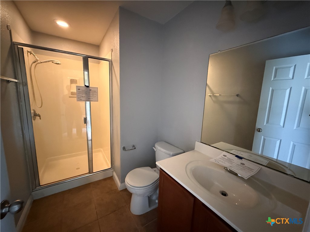 5607 Siltstone Loop Killeen, TX 76542 - Photo 39 of 48 a bathroom with a sink toilet and shower