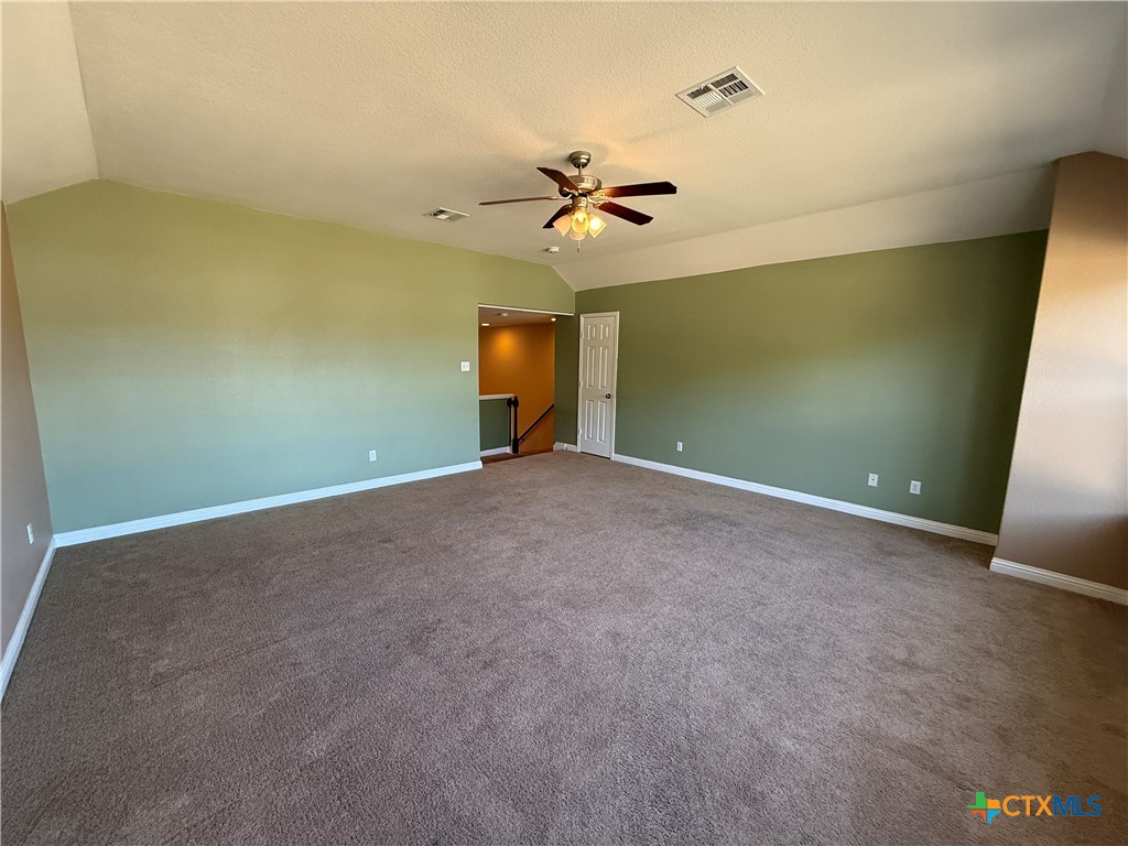 5607 Siltstone Loop Killeen, TX 76542 - Photo 41 of 48 a view of a big room with carpet
