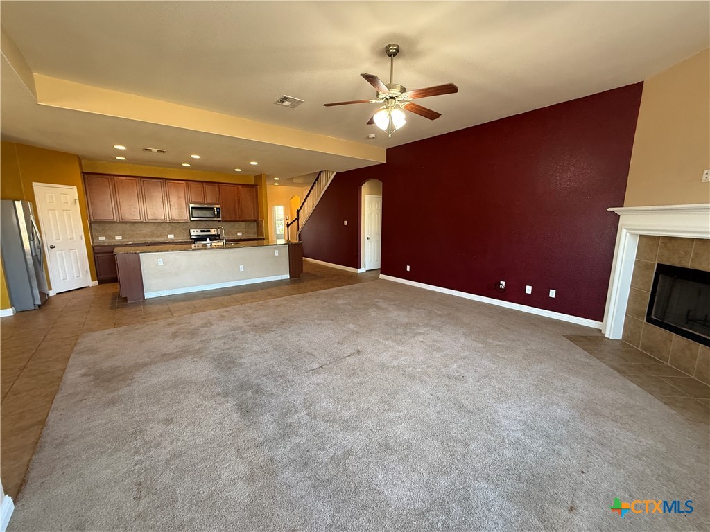 5607 Siltstone Loop Killeen, TX 76542 - Photo 5 of 48 a view of a livingroom with furniture and chandelier