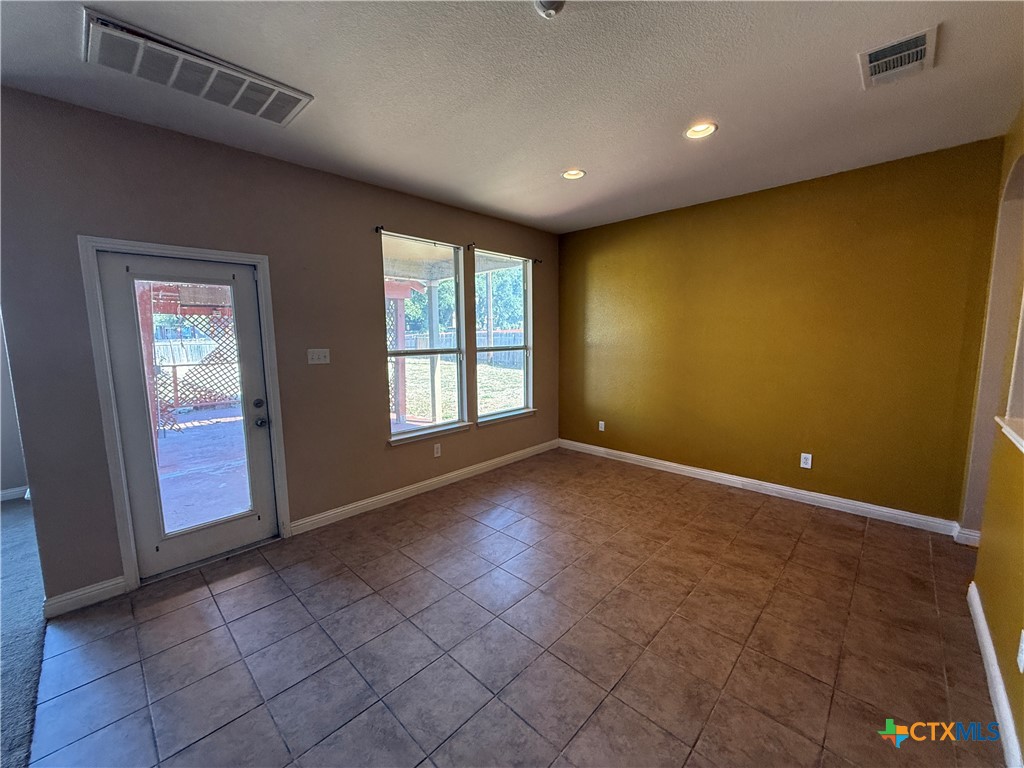 5607 Siltstone Loop Killeen, TX 76542 - Photo 10 of 48 a view of an empty room with a window