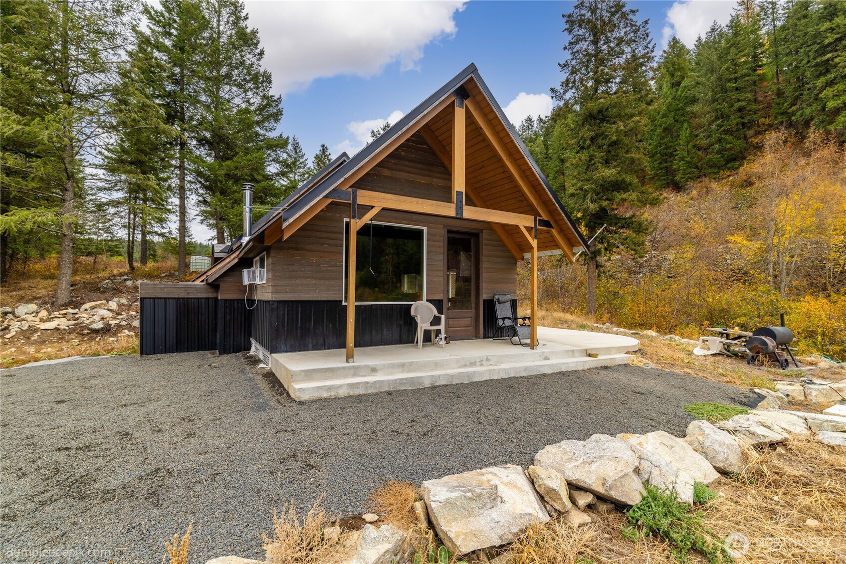 8 Camden Road Elk, WA 99009 - Photo 2 of 29 a view of a house with backyard