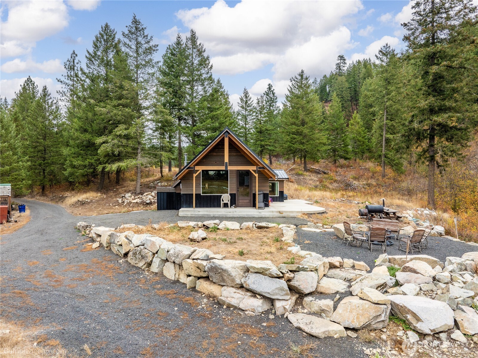 8 Camden Road Elk, WA 99009 - Photo 27 of 29 a view of a house with a yard